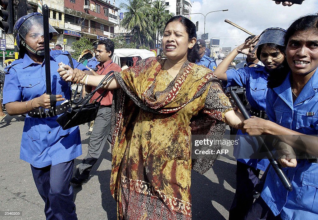 Female Riot Police Bangladeshi female riot police arrest a woman activist of the main ...