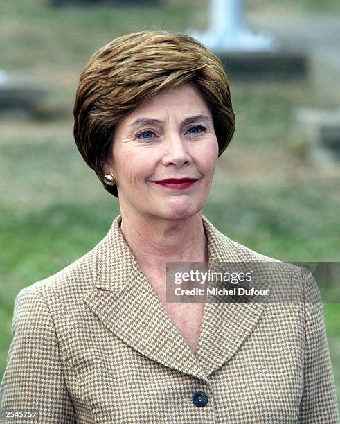 First Lady Laura Bush attends a flag ceremony at UNESCO headquarters on September 29, 2003 in Paris, France. This is the first visit by the U.S. In...