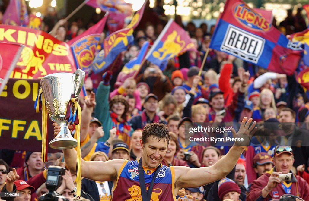 Alastair Lynch for the Lions celebrates with the crowd