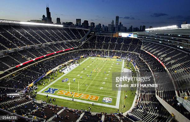This photo shows a view of the newly renovated Soldier Field, the home of the NFL's Chicago Bears, with the Chicago skyline in the background 29...