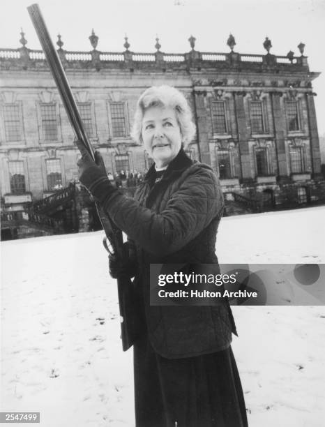 Deborah Mitford, the Duchess of Devonshire out shooting, 25th March 1980.