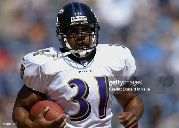Running back Jamal Lewis of the Baltimore Ravens runs against the San Diego Chargers on September 21, 2003 at Qualcomm Stadium in San Diego,...