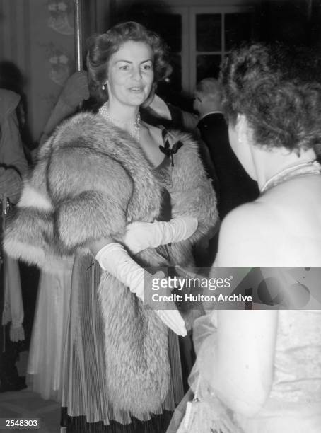 Deborah Mitford, the Duchess of Devonshire, attending the Royal Society of St George banquet, 7th October 1954.