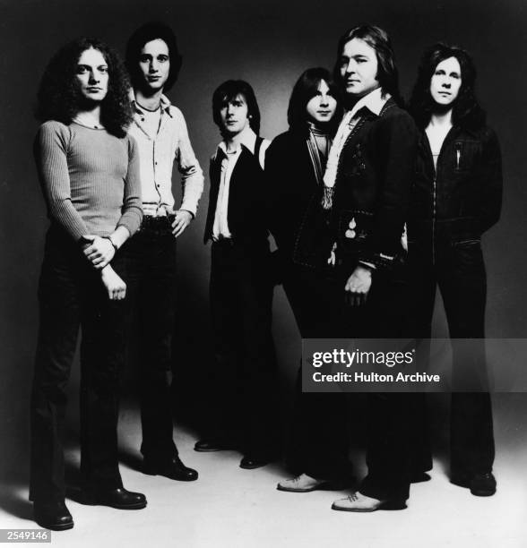 Promotional studio portrait of American rock group Foreigner, 1977. : Lou Gramm, Ian McDonald, Al Greenwood, Mick Jones, Dennis Elliot.