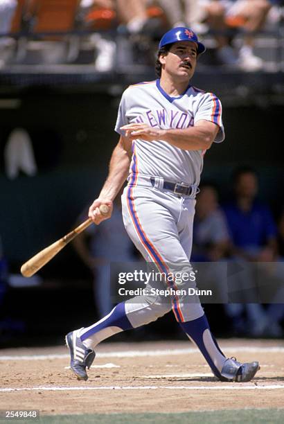 Keith Hernandez of the New York Mets follows his swing during a game in the 1988 season.