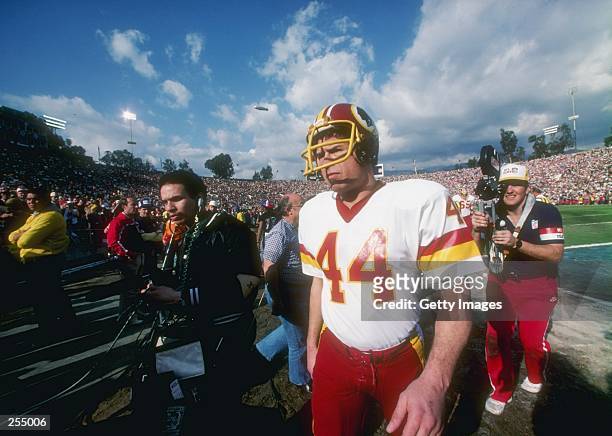 Running back John Riggins of the Washington Redskins looks on during the Super Bowl XVII against the Miami Dolphins at the Rose Bowl in Pasadena,...