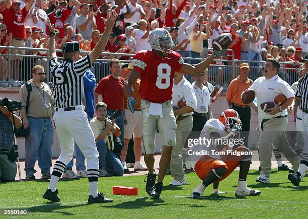 Split end Drew Carter of the Ohio State University Buckeyes celebrates after catching a touchdown pass against the Bowling Green State University...