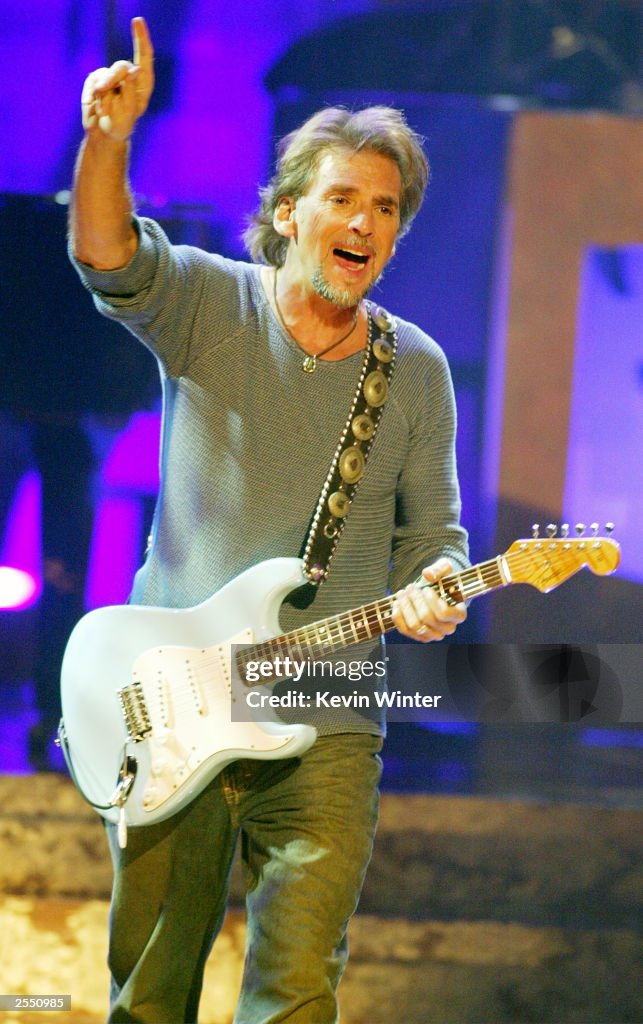 Kenny Loggins performs on stage