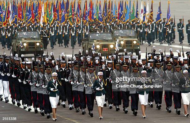 South Korean Army honor guards march during the 55th Armed Forces Day ceremony at the Sungnam military airport October 1, 2003 in Sungnam, South...