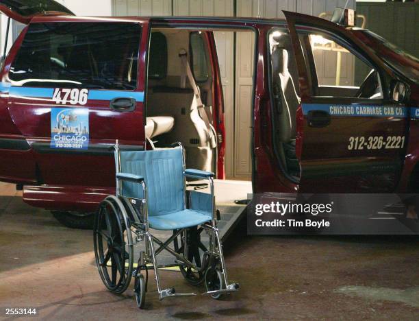 Wheelchair is seen outside a Chicago Carriage Cab van modified for wheelchair-client transportation at Chicago Carriage Cab headquarters October 1,...