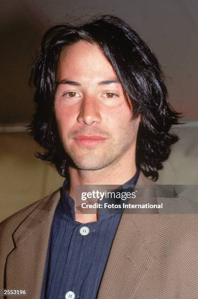 Actor Keanu Reeves holds a motorcycle helmet while attending the Independent Feature Project/West's 1993 Independent Spirit Awards, Santa Monica,...