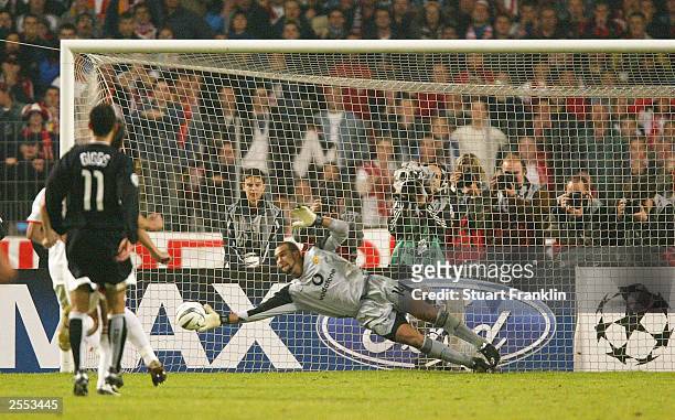 Goalkeeper Tim Howard of Manchester United saves the penalty taken by Fernando Meira of Vfb Stuttgart during the UEFA Champions League Group E match...