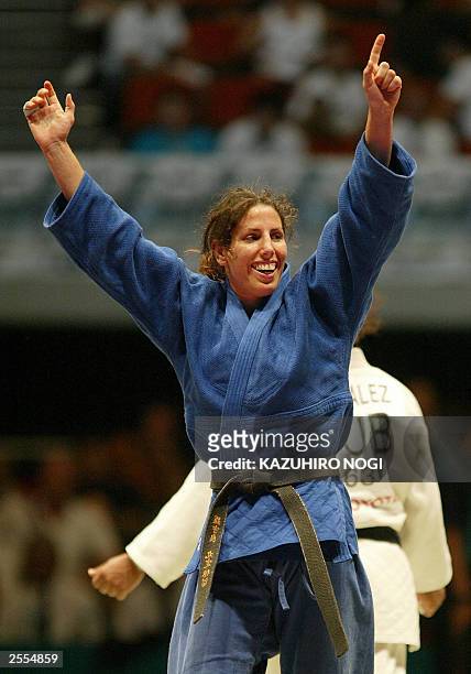 Daniela Krukower of Argentina celebrates her victory over Driulis Gonzalez of Cuba during the women's 63 kg category final match at the World Judo...