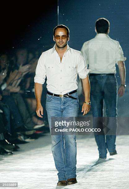 Fashion designer Tom Ford walks on the catwalk at the end of the Gucci collection during the Milan's 2004 Spring/Summer fashion week 02 October 2003....