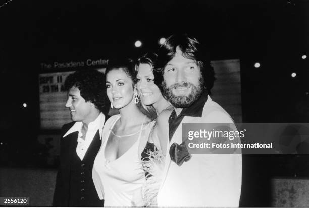 American talent manager Ron Samuels, his wife actor Lynda Carter, actor Lindsay Wagner, and her huband Michael Brandon arrive at the Emmy Awards,...