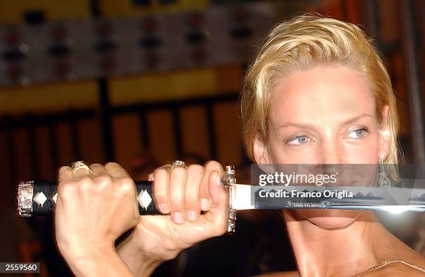 Actress Uma Thurman arrives at the screening of the Quentin Tarantino's film "Kill Bill" at the Adriano Cinema October 3, 2003 in Rome, Italy.