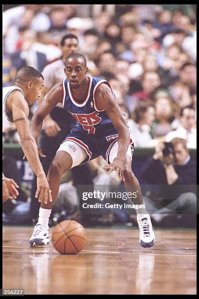 Guard Kenny Anderson of the New Jersey Nets moves the ball during a game against the Boston Celtics at the Fleet Center in Boston, Massachusetts. The...