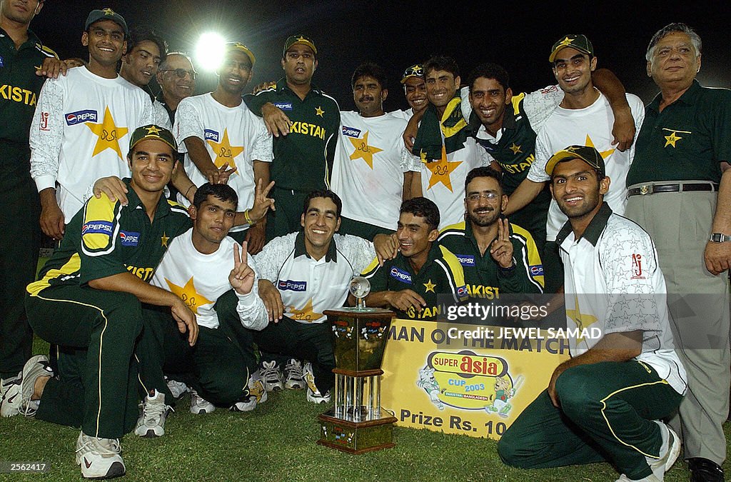 A jubilant Pakistani cricket team pose f