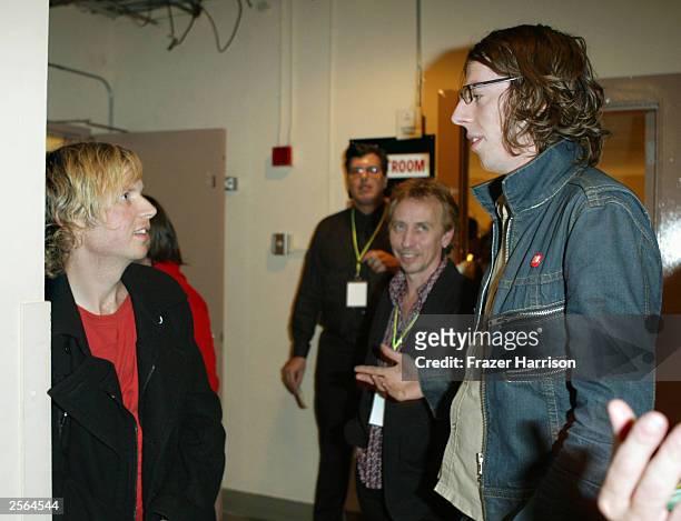 Singer Beck and drummer Patrick Carney pose backstage during the 3rd Annual Shortlist Concert at The Wiltern October 5, 2003 in Los Angeles,...