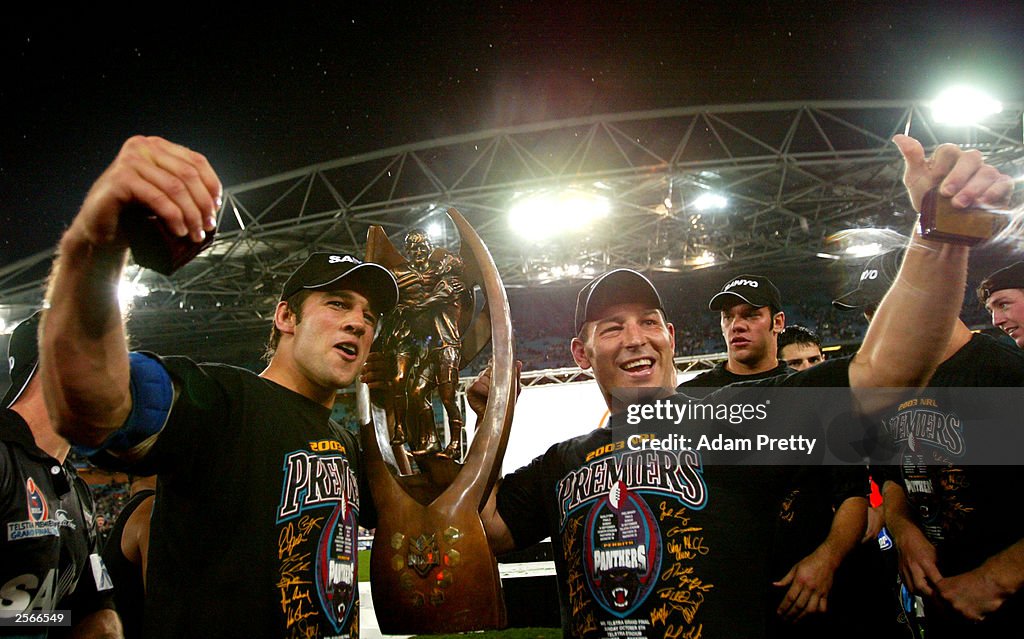 Ryan Girdler and Craig Gower of the Panthers celebrates victory