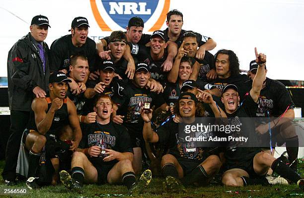 The Penrith Panthers celebrate victory after the NRL Grand Final between the Sydney Roosters and the Penrith Panthers at Telstra Stadium October 5,...