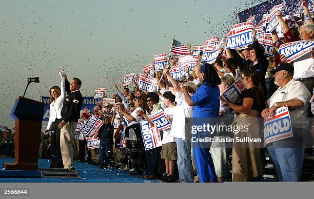 Republican gubernatorial candidate Arnold Schwarzenegger and his wife Maria Shriver attend a rally at the San Bernardino International Airport...