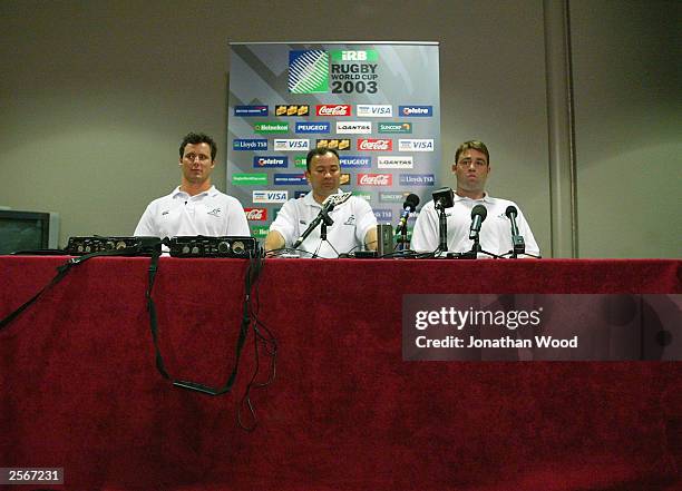 Alastair Baxter, Eddie Jones and David Lyon of Australia speak with the press during a press conference to announce the team to play Argentina in the...