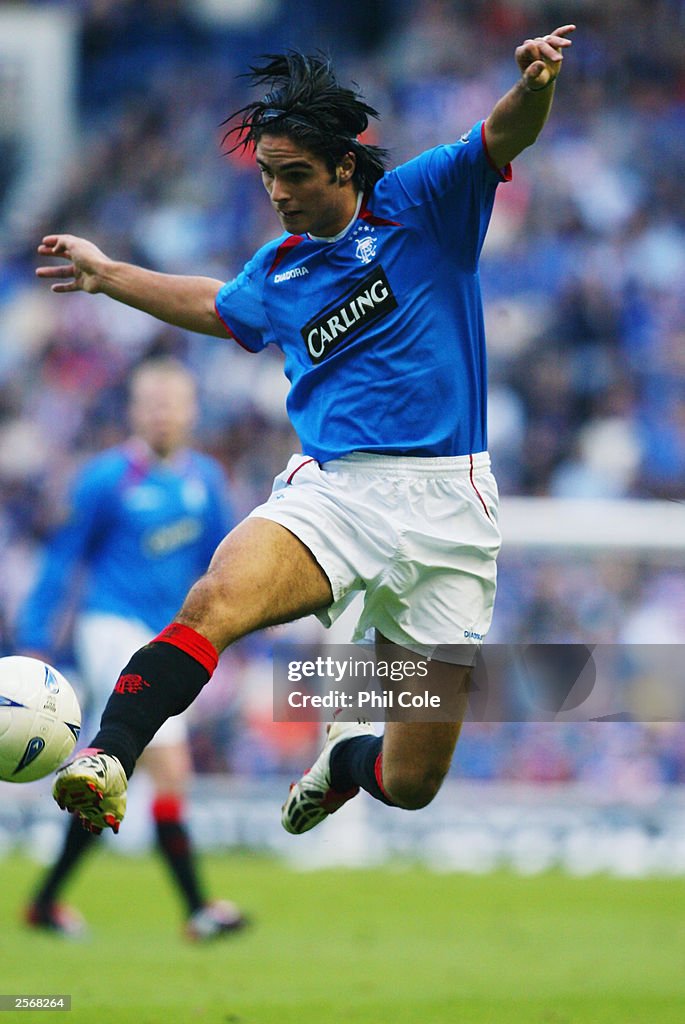 Mikel Arteta of Glasgow Rangers attempts to control the ball during