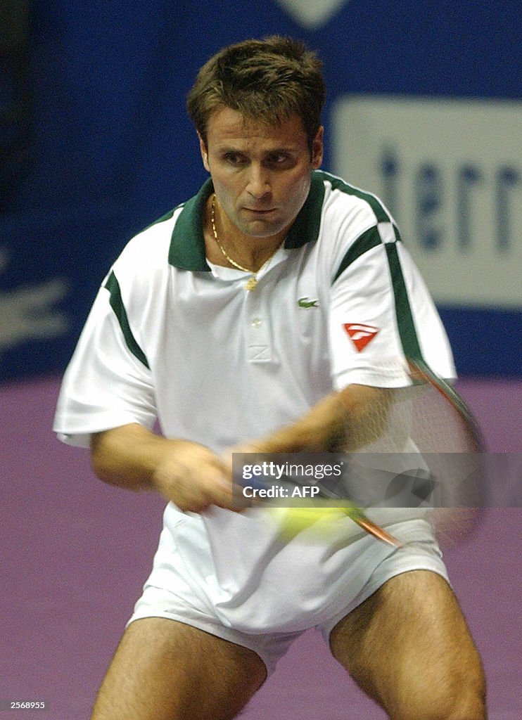 French Fabrice Santoro hits a backhand t