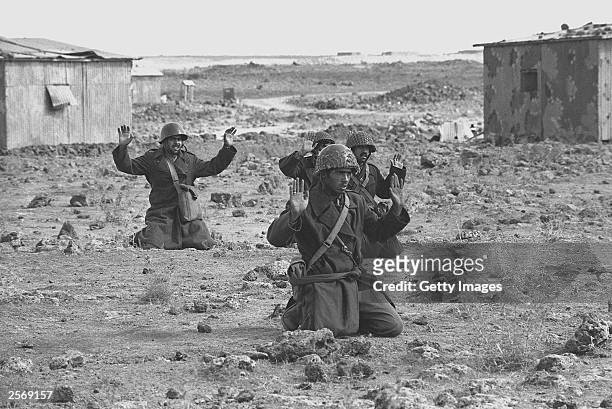 Syrian soldiers raise their hands in surrender October 10, 1973 on the Golan Heights, five days into the Yom Kippur War. Israeli Prime Minister Ariel...