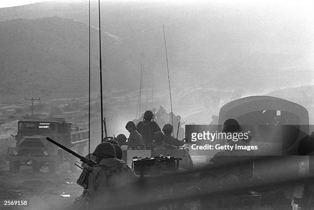 Israeli troops move into action against the invading Syrians October 8, 1973 on the Golan Heights during the Yom Kippur War. Current Israeli Prime...