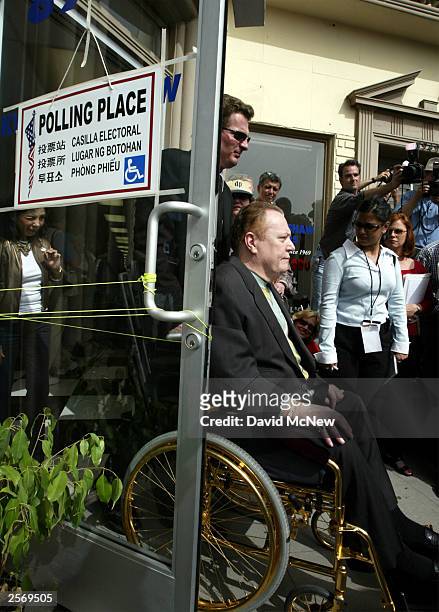 Gubernatorial candidate Larry Flynt, publisher of Hustler magazine, leaves after voting in the recall election of Gov. Gray Davis October 7, 2003 in...