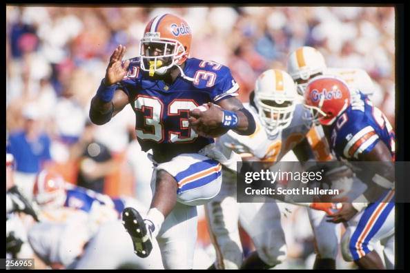 Errict Rhett R&b Running back Errict Rhett of the Florida Gators runs down the field ...