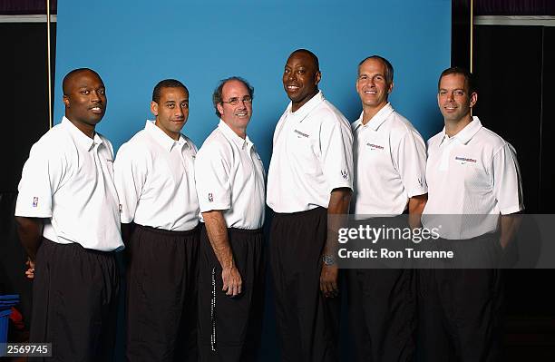 Ron Oliver, Bob Beyer, head coach Kevin O'Neill, Tony Brown, Jay Triano and Jim Sann of the Toronto Raptors pose for a portrait during NBA Media Day...