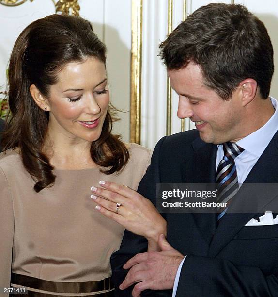 Mary Elizabeth Donaldson and His Royal Highness Crown Prince Frederik of Denmark show their engagement ring to the media during a press conference at...