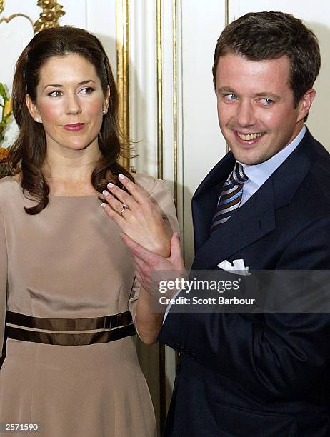 Mary Elizabeth Donaldson and His Royal Highness Crown Prince Frederik of Denmark show their engagement ring to the media during a press conference at...