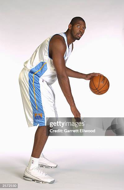 Nene of the Denver Nuggets poses for a portrait during NBA Media Day at the Pepsi Center on October 2, 2003 in Denver, Colorado. NOTE TO USER: User...