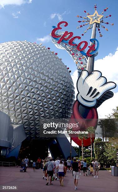 Guests leave Walt Disney World's Epcot October 8, 2003 near Orlando, Florida.