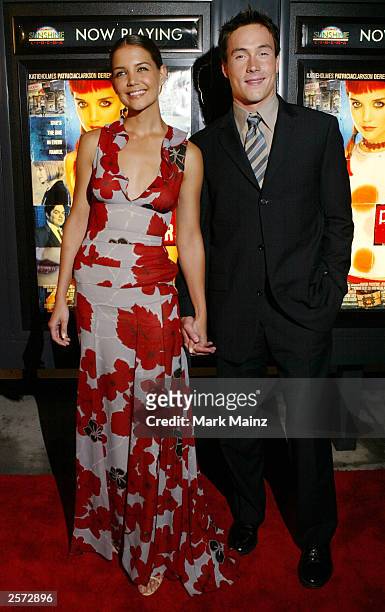 Actress Katie Holmes and Chris Kline arrive for the premiere of "Pieces of April" at the Sunshine Theatre October 8, 2003 in New York City.