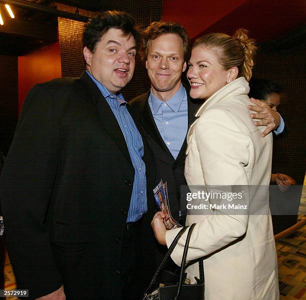 Actor Oliver Platt, director Peter Hedges and Kristen Johnston attend the premiere of "Pieces of April" at the Sunshine Theatre October 8, 2003 in...