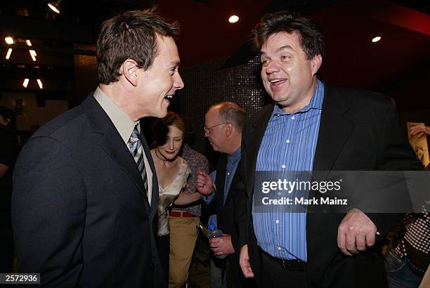 Actors Chris Kline and Oliver Platt attend the premiere of "Pieces of April" at the Sunshine Theatre October 8, 2003 in New York City.