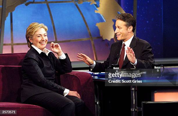 Senator Hillary Rodham Clinton appears with Jon Stewart during "The Daily Show With Jon Stewart" at the Daily Show Studios October 8, 2003 in New...