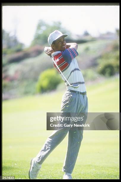 Tiger Woods completes a shot during the 1992 Los Angeles Open at the Riviera Country Club in Pacific Palisades, California. Mandatory Credit: Gary...
