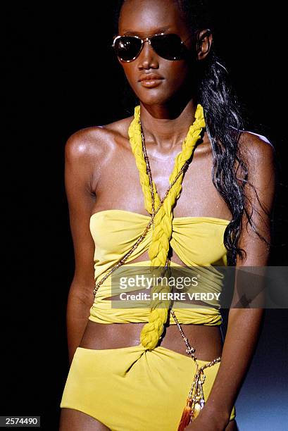 Model presents a creation for Emanuel Ungaro 09 October 2003 in Paris during the ready-to-wear Spring/Summer 2004 collections. AFP PHOTO PIERRE VERDY