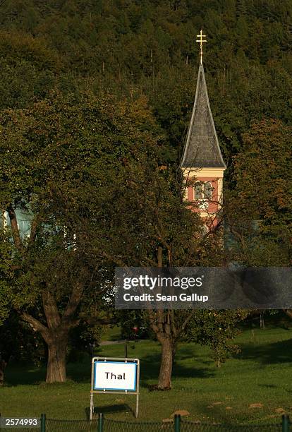 Church stands near a sign marking the city limits of the village of Thal, Austria, October 9, 2003 where newly-elected California Governor Arnold...