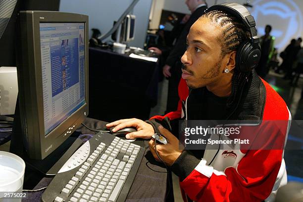 Recording artist Ludacris tests out Napster 2.0 October 9, 2003 during the launch of Napster 2.0 in New York City. The new Napster service will be...