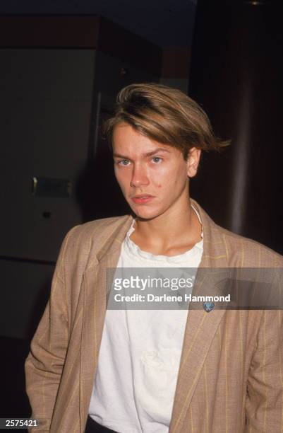 American actor River Phoenix posing at press conference, September 23, 1988.