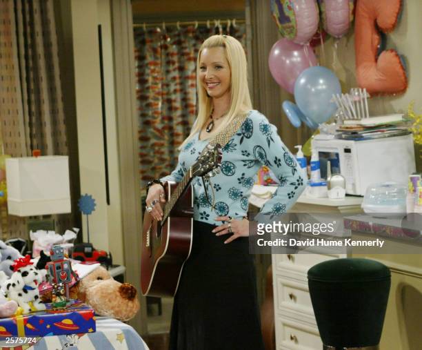 Lisa Kudrow, who plays the ditzy Phoebe Buffay on the hit NBC series "Friends" performs during one of the series' last shows on the Warner Bros lot...