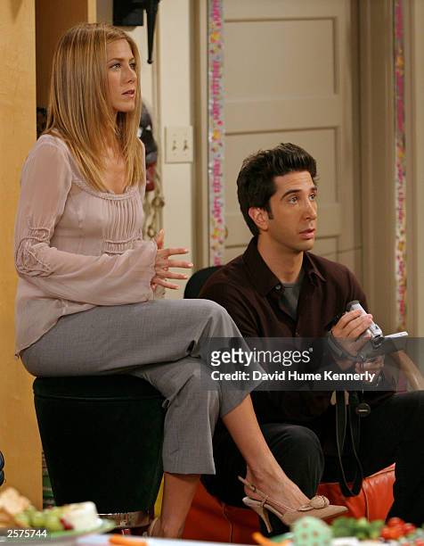 Jennifer Aniston and David Schwimmer of the hit NBC series "Friends" perform during one of their last shows on the Warner Bros lot Sept. 12, 2003 in...