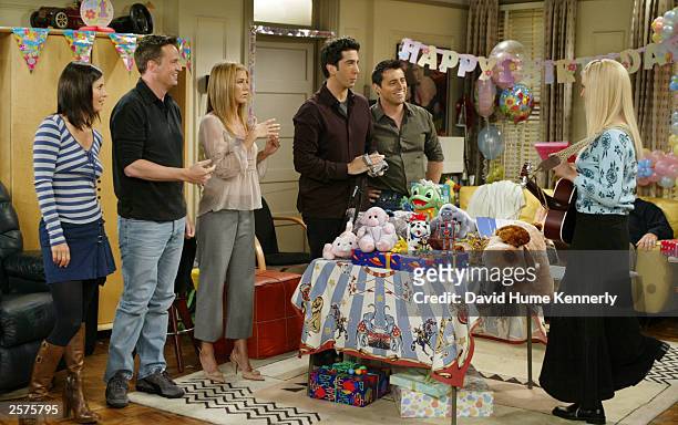 The cast of the hit NBC series "Friends," Courteney Cox Arquette, Matthew Perry, Jennifer Aniston, David Schwimmer, and Matt LeBlanc, listen to Lisa...